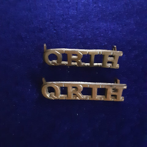 Original pair of brass shoulder titles the Queen's Royal Irish Hussars (QRIH)