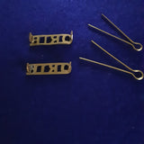 Original pair of brass shoulder titles the Queen's Royal Irish Hussars (QRIH)
