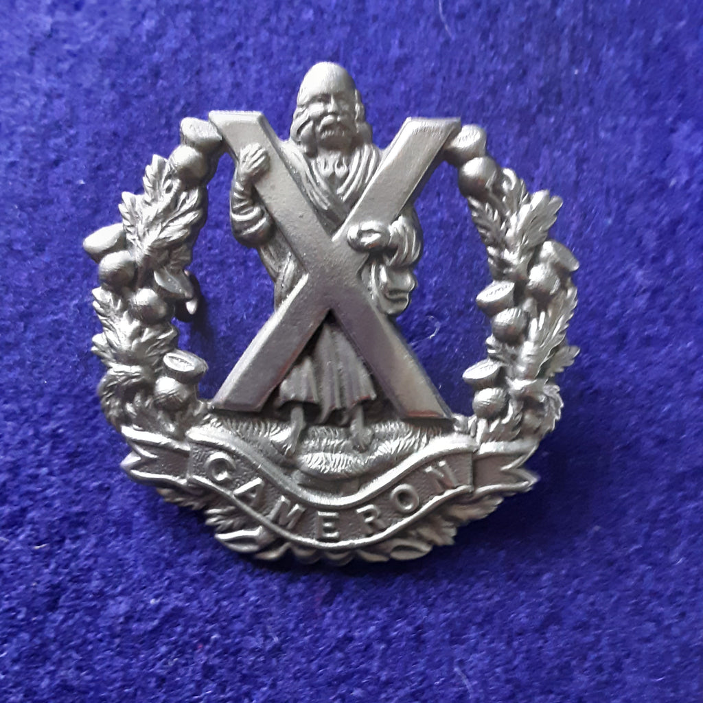 Original cap badge The Queen's Own Cameron Highlanders
