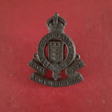 Original plastic WW2 cap badge Royal Army Ordnance Corps