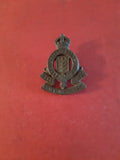 Original plastic WW2 cap badge Royal Army Ordnance Corps